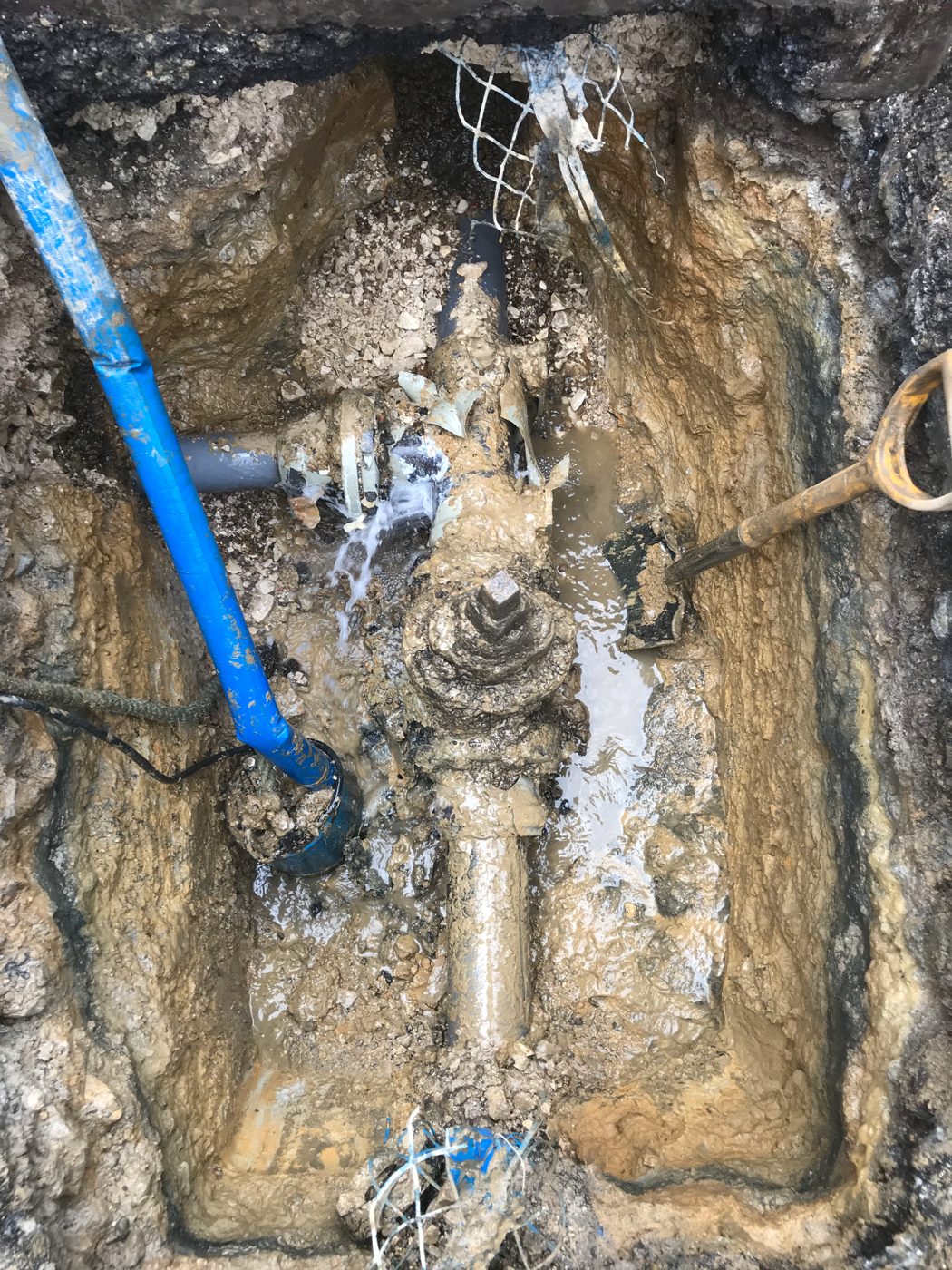 Valve assembly in excavated pit